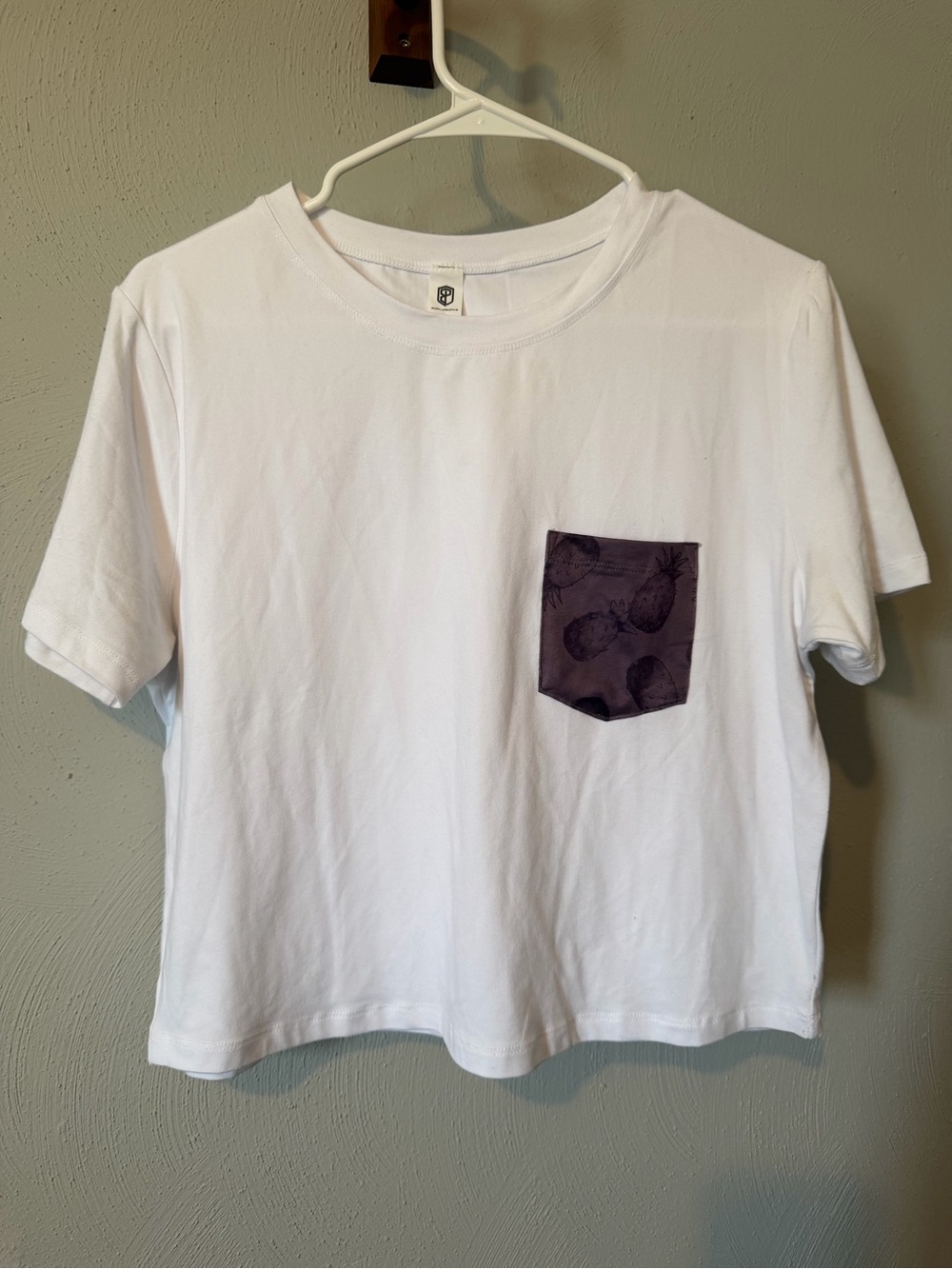 Born Primitive White Short Sleeve Tee with Dark Purple Pineapple Pocket